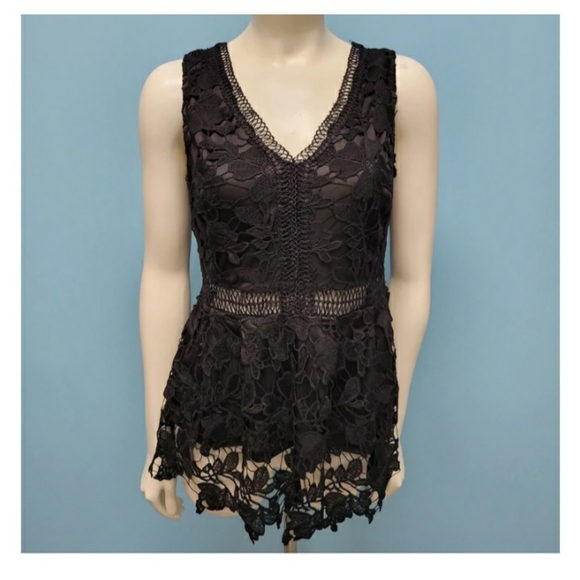 Women's peplum top - Picture 1 of 2